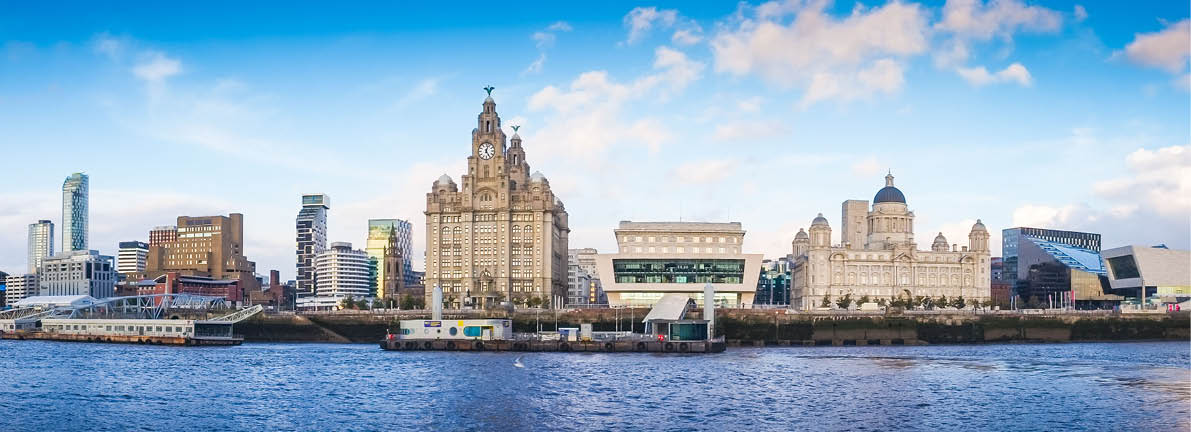 Panoramic view of Liverpool waterfront,  including modern office buildings and the River Mersey 