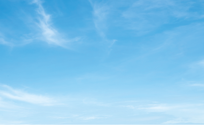 A clear blue sky with a subtle gradient fading to white at the bottom. Description generated by AI