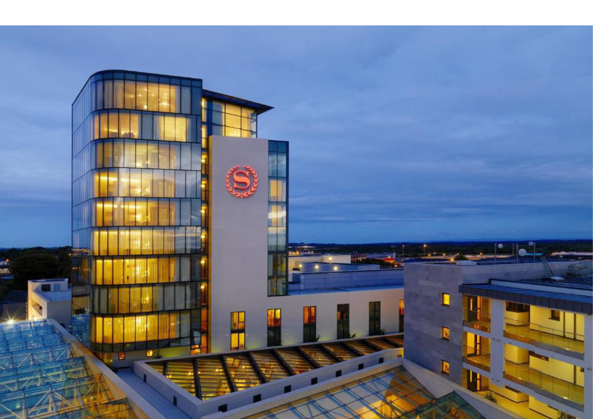 A tall building with many windows and a red sign on the side. AI generated content