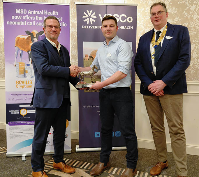 Three men are standing in front of a banner, shaking hands and holding a trophy. AI generated content