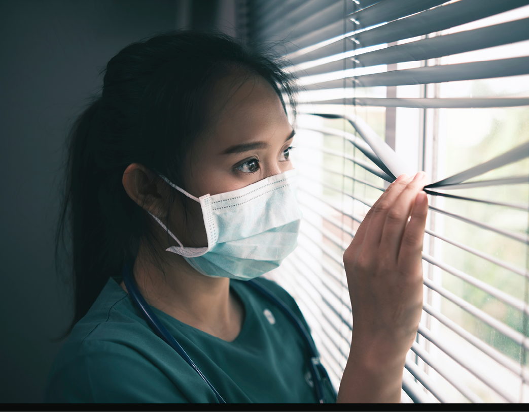 Asian female healthcare worker doctor nurse surgeon wearing protective surgical mask corona covid-19 virus prevention, feeling worried anxious anxiety traumatized scared, medical stress at hospital
