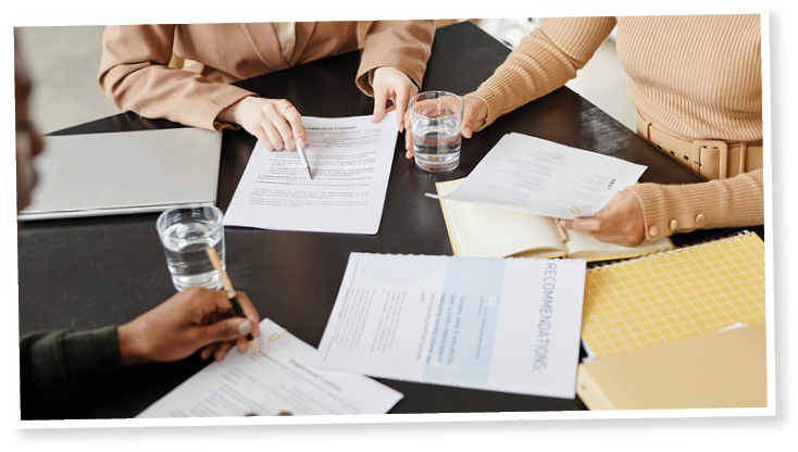 High angle view at meeting table in office with people in job interview