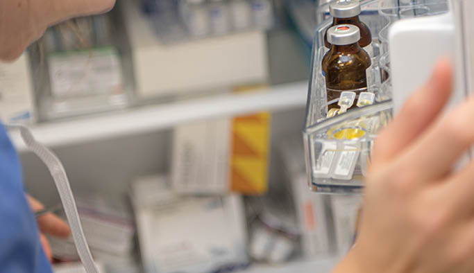 A lot of medicines in a fridge. Close-up of an opened refrigerator